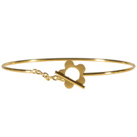 Bracelet jonc avec fermoir cabillaud en forme de fleur en acier doré.