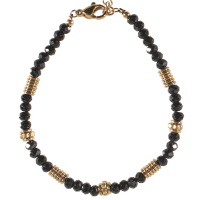 Bracelet composé de perles cylindriques en acier doré et de perles en pierre de couleur noire. Fermoir mousqueton avec 3 cm de rallonge.