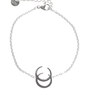 Bracelet composé d'une chaîne avec deux croissants de lune en acier argenté. Fermoir mousqueton avec 3 cm de rallonge.
