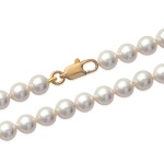 Bracelet en plaqué-or. Perles d'imitation de Majorque.
