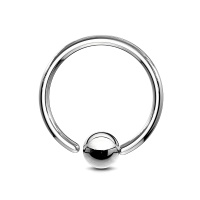 Piercing anneau en acier chirurgical 316L argenté.