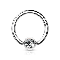 Piercing anneau en acier chirurgical 316L argenté serti d'un cristal.