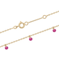 Bracelet composé d'une chaîne en plaqué or jaune 18 carats et de pampilles en oxydes de zirconium rouges. Fermoir anneau de ressort avec anneaux de rappel à 16 et 18 cm.