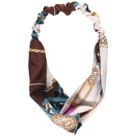 Bandeau élastique pour cheveux en textile de couleur avec motifs.