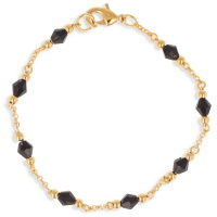 Bracelet composé d'une chaîne en plaqué or jaune 18 carats et de perles de cristaux noirs.