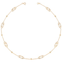 Bracelet composé d'une chaîne avec boules et motifs filigranes en plaqué or jaune 18 carats.
